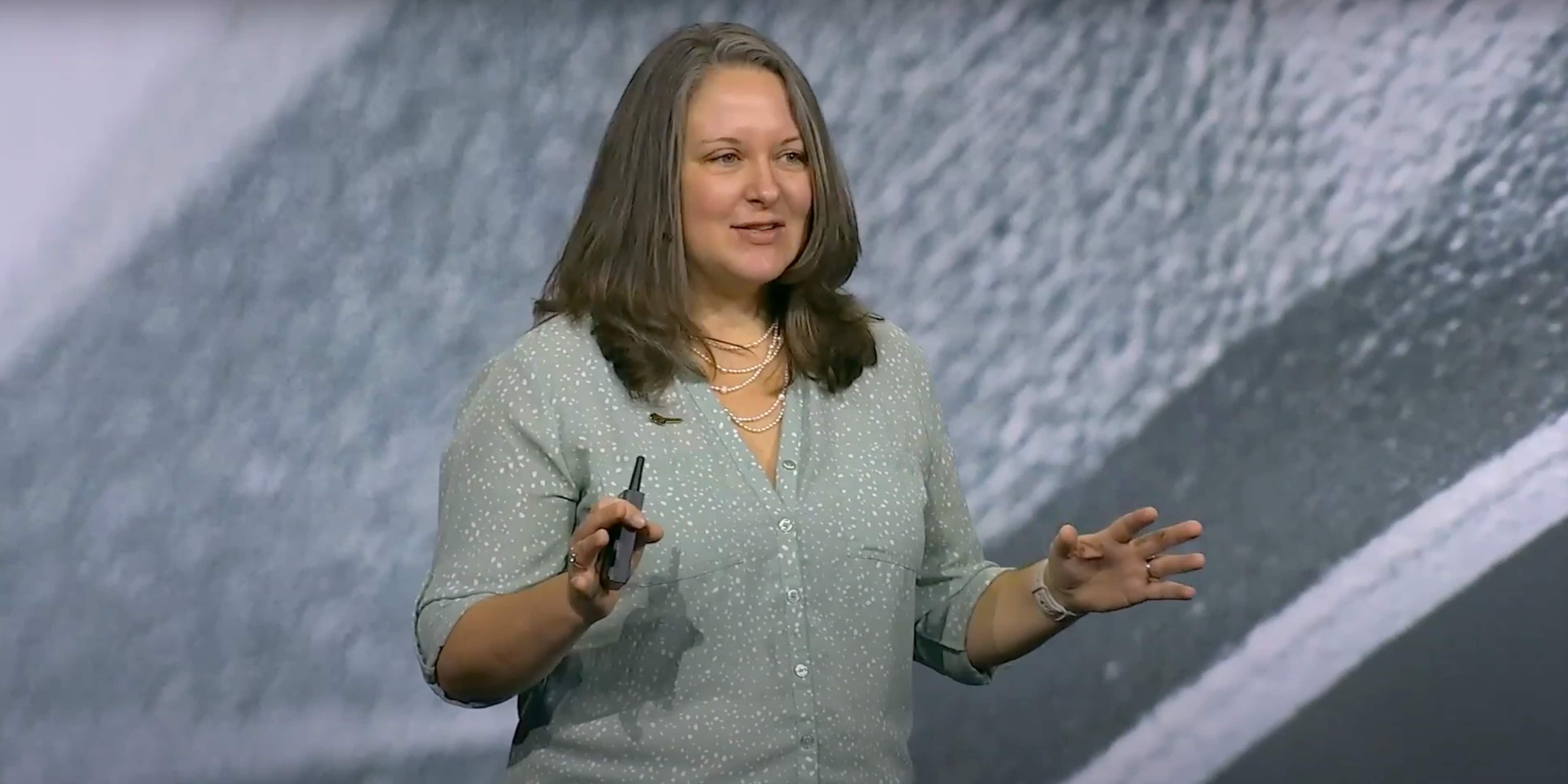 SHADOWMACHINE’s Art Department Production Manager Whitney Schmerber presents on stage at Autodesk University 2023.
